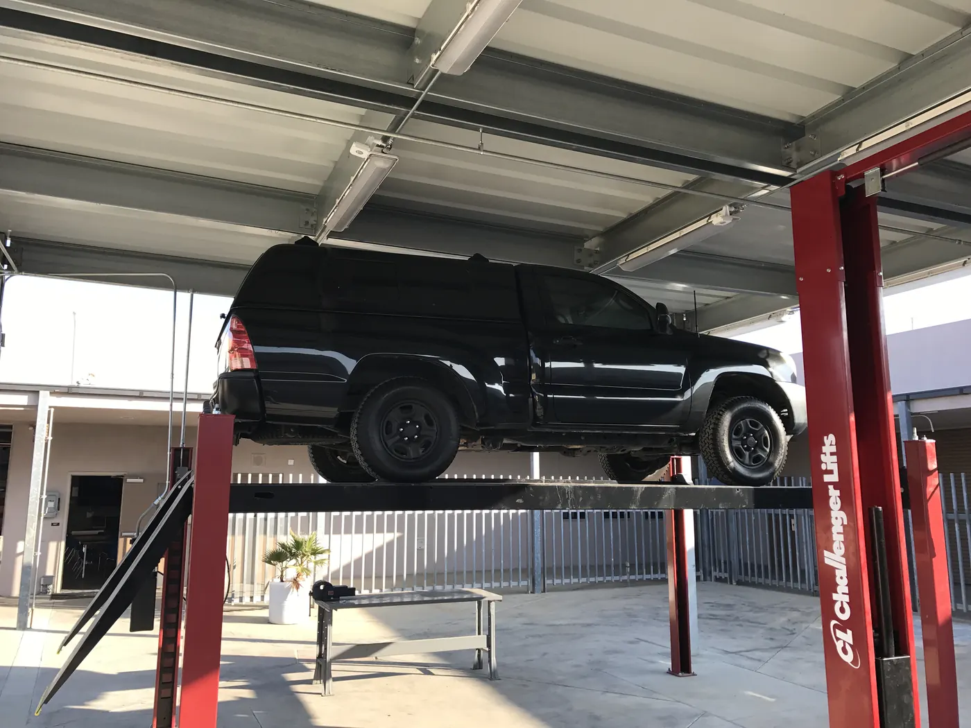 Challenger 15,000 lbs 4-Post Lift installed by Autolift & Equipment Service in Southern California