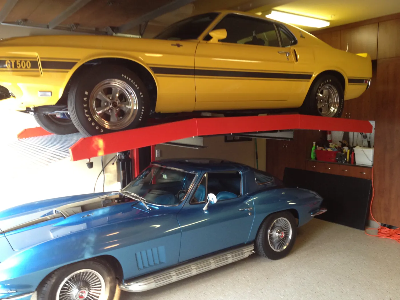 A home garage with a car storage lift installed